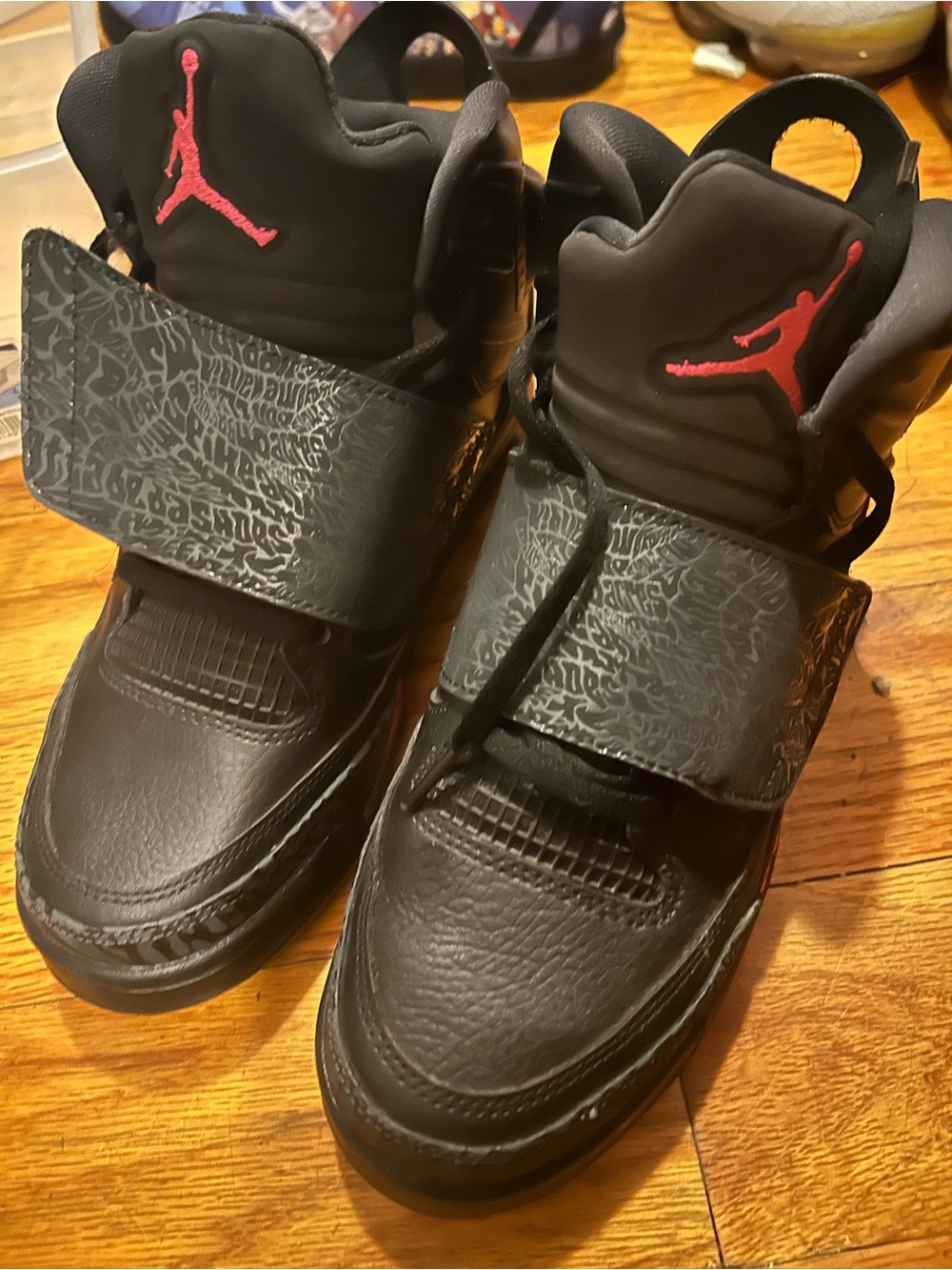 Jordan Kids Black Sneakers with Red Jumpman Accents